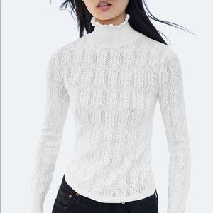 White scallop edge turtle neck